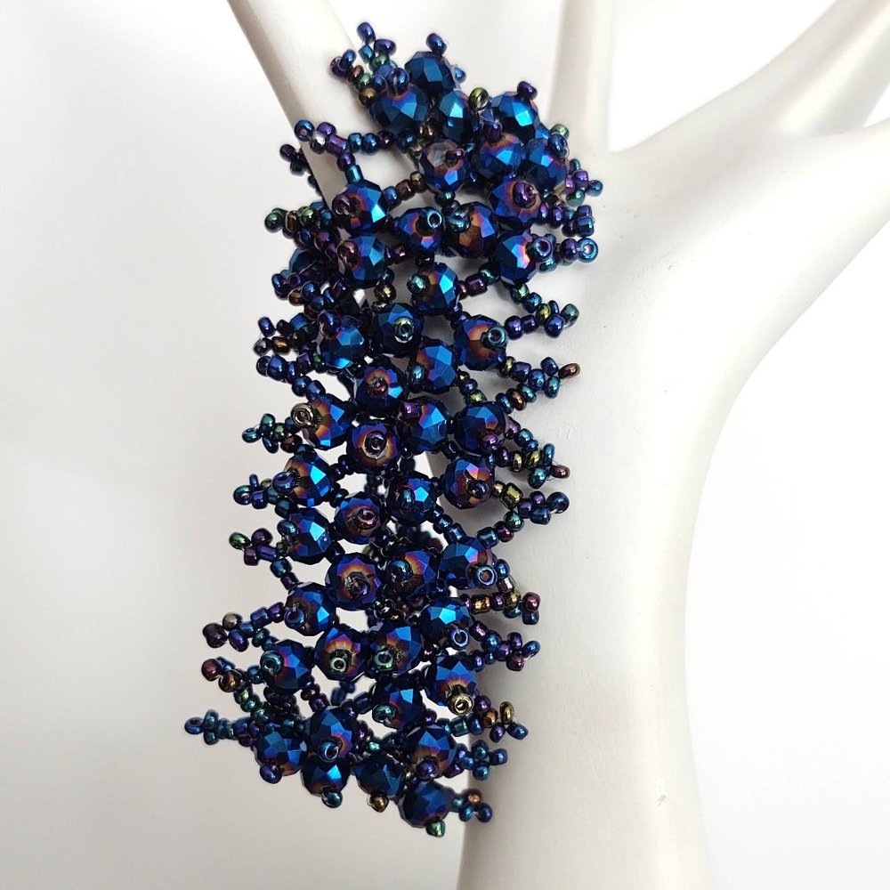 Iridescent multi color seed and faceted bead toggle close bracelet
